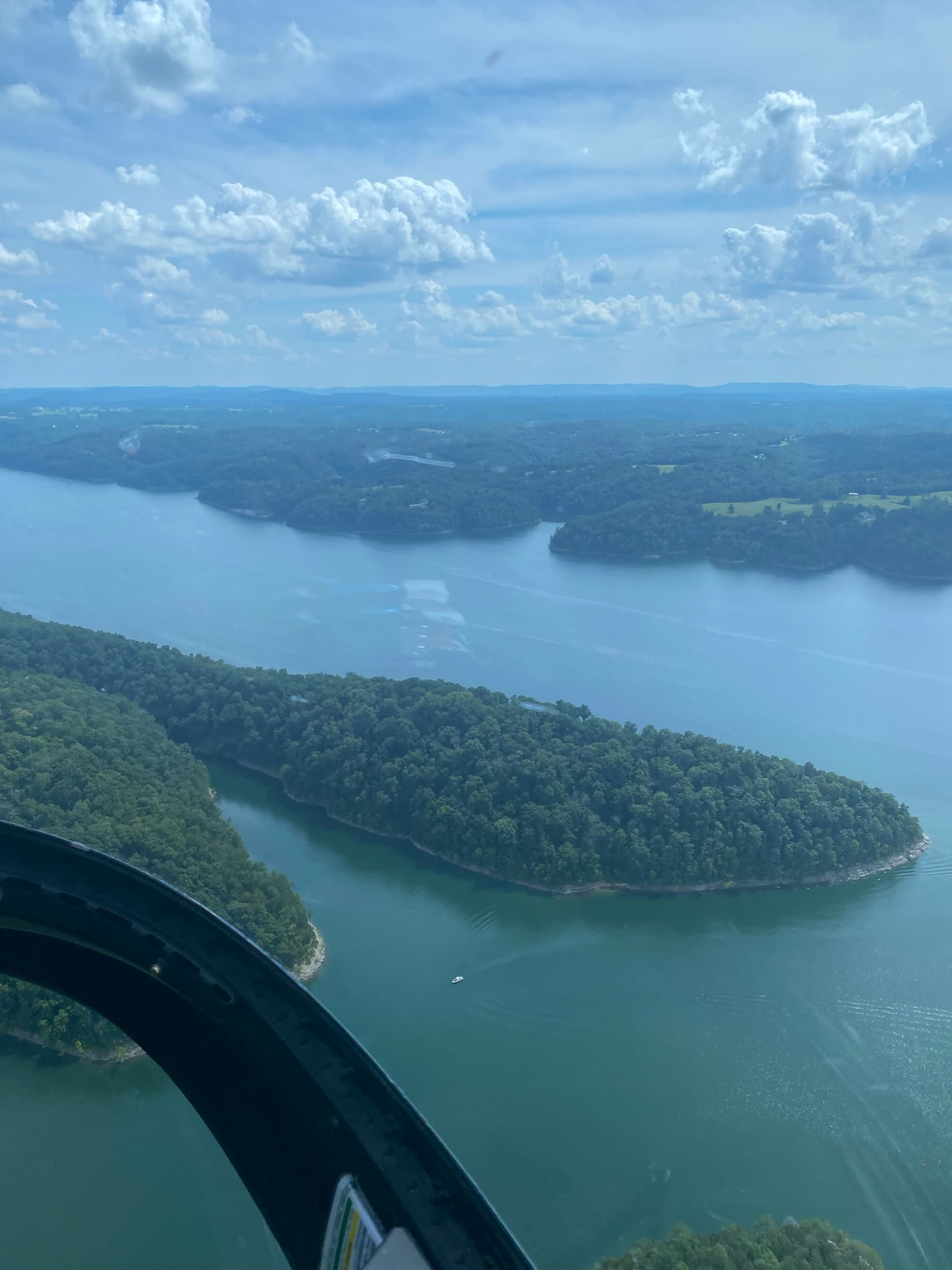 A wooded point stretching into Lake Cumberland